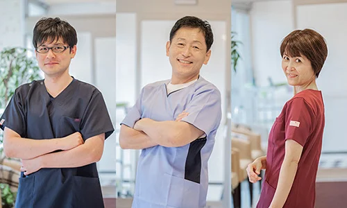 A team of acupuncturists working on treatment with a lumbar support belt