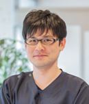 Acupuncturist Akihiro Sagara, working on the treatment of intractable diseases